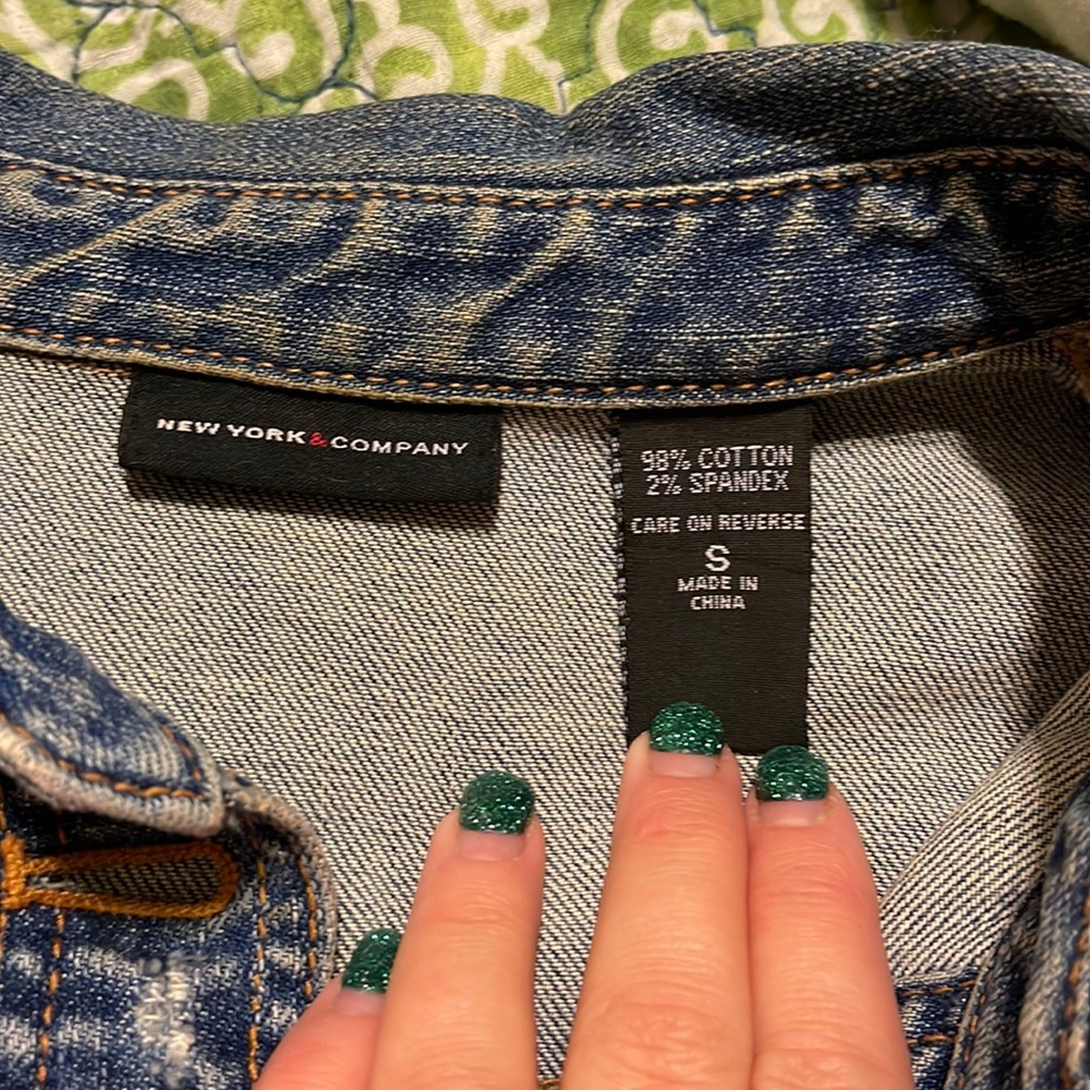 Denim jacket with very slight distressing